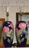 A pair of Moorcroft magnolia pattern table lamps                                                                                       