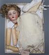 A Simon & Halbig doll, original wig, vintage clothes, head marked 403, missing one lower limb                                          