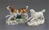 A Rockingham porcelain figure of a springer spaniel, c.1830 and a Samson copy, L. 8.5cm and 10.5cm                                     