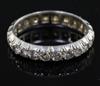 A platinum and diamond set full eternity ring, size O.                                                                                 