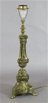 A 19th century Continental brass overlaid altar stick table lamp, height 33in.                                                         