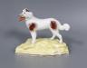A Samuel Alcock bone china dog, c.1830-50, 9.5cm high                                                                                                                                                                       