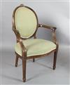 A set of eight Hepplewhite design mahogany elbow chairs, W.2ft 3in. H.3ft 2in.                                                         