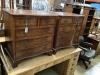 A pair of Georgian style walnut serpentine-fronted chests of drawers, of small proportions, each fitted two short drawers and three long drawers, on bracket feet, width 74cm, depth 46cm, height 78cm W 74cm               