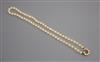 A single strand cultured pearl necklace, with 14k and cultured pearl cluster set clasp, 52cm.                                          