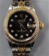 A lady's steel and gold Rolex Oyster Perpetual Datejust wrist watch,                                                                   