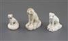 Three Rockingham porcelain toy figures of seated dogs, c.1830,                                                                         