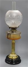 An oil lamp overall height 66cm                                                                                                        