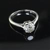 An 18ct white gold and platinum solitaire diamond ring, size L.                                                                        