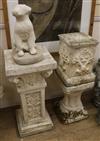 Three reconstituted stone pedestals and a model of a puppy (4) W.30, 25cm, 24cm and 18cm                                               