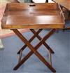 A 19th century mahogany butler's tray and stand W.74cm                                                                                 