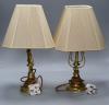 A pair of brass ship’s lamps, height 45cm                                                                                                                                                                                   