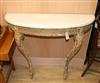 A marble-topped gilt console table.                                                                                                    