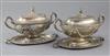 A pair of George III silver oval two handled sauce tureens, covers and stands by Tudor & Leader, 44.5 oz.                              