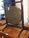 A dinner gong and stand W.63cm                                                                                                         