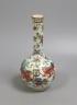 A 19th century Chinese famille rose bottle vase (dogs of fo), 17 cms high.                                                                                                                                                  