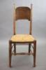 A set of six oak chairs, including a pair of carvers, in the Glasgow School manner by William Birch, High Wycombe, carvers W.58cm D.54cm H.109cm                                                                            