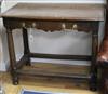 A Cromwellian oak side table, fitted single long drawer with shaped frieze, on gun barrel turned supports W.97cm                       