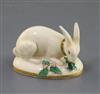 A Rockingham porcelain figure of a rabbit, c.1830, L. 7cm, restored                                                                    