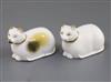 Two Rockingham porcelain figures of a recumbent cat, c.1830, L. 6.7cm and 7cm, chips to ears                                           