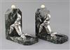 Maurice Frecourt. A pair of Art Deco silvered spelter marble and ivory bookends, 7.5in.                                                