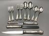 Seven items of George IV silver shell pattern flatware, William M. Traies, London, 1829, one other similar dessert fork and three silver handled knives, weighable silver 19.5 oz.                                          