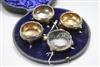 A matched set of four 18th century later embossed silver bun salts, in case with two associated spoons.                                