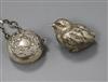 A Victorian novelty silver pepper pot, in the form of a wren, London, 1881 and an Edwardian silver pill box, on a chain.               