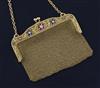 A French pierced 18ct gold, ruby, sapphire and diamond mesh evening purse, width 10cm.                                                 