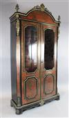 A mid 19th century French red boulle work and ebony bookcase, W.4ft 1in. D.1ft 6in. H.7ft 10in.                                        