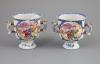 A pair of Chinese famille rose two handled cups, Qianlong period, 9.5cm high, slight faults                                                                                                                                 