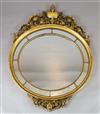 A mid 20th century carved giltwood wall mirror, W.3ft 9in. H.4ft 8in.                                                                  