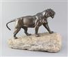 Pierre Granet (1843-1910). A French Art Deco bronze model of a tiger, height 12.5in. length 18in.                                      