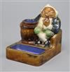 A Royal Doulton stoneware gnome smoking bibelot                                                                                        