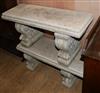 A pair of reconstituted stone Roman garden seats W.98cm                                                                                