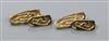 A stylish pair of 9ct gold shaped oval cufflinks decorated in the manner of Archibald Knox, maker's mark AHL.                          