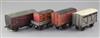 A cattle wagon, no.46219, in grey, a flat truck, no.M260113, in grey with LMS container, a horse box,                                  