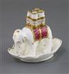 A Rockingham porcelain 'elephant' quill holder, c.1830-42, H. 9.5cm, chip to one quill holder                                          