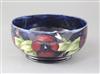 A Moorcroft pansy pattern bowl, diameter 8.25in.                                                                                       
