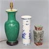 A Chinese green glazed lamp, a blue and white sleeve vase and a crackle glaze vase                                                     