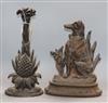 Two Victorian cast iron door stops Largest 35cm                                                                                        