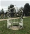 A white painted wrought iron circular gazebo combined seat                                                                             