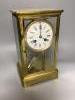 A late 19th century French gilt brass four glass mantel clock 26cm                                                                                                                                                          