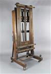 A late Victorian mahogany studio easel, W.2ft 8in. H.6ft 1in.                                                                          