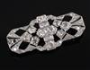 A 1930's/1940's pierced platinum? and diamond set brooch,                                                                              