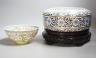 A Chinese cloisonne enamel box and cover, wood stand and a boxed eggshell porcelain bowl                                                                                                                                    