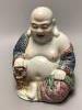 A Chinese famille rose figure of Budai, height 19cm                                                                                                                                                                         