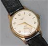 A gentleman's 9ct gold Longines manual wind wrist watch.                                                                               