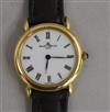 A lady's 18ct gold Baume and Mercier quartz wrist watch.                                                                               