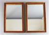 A pair of rectangular gilt and red lacquered wall mirrors                                                                              